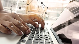 Double exposure of business man hand working on blank screen laptop computer on wooden desk as concept with social media diagram